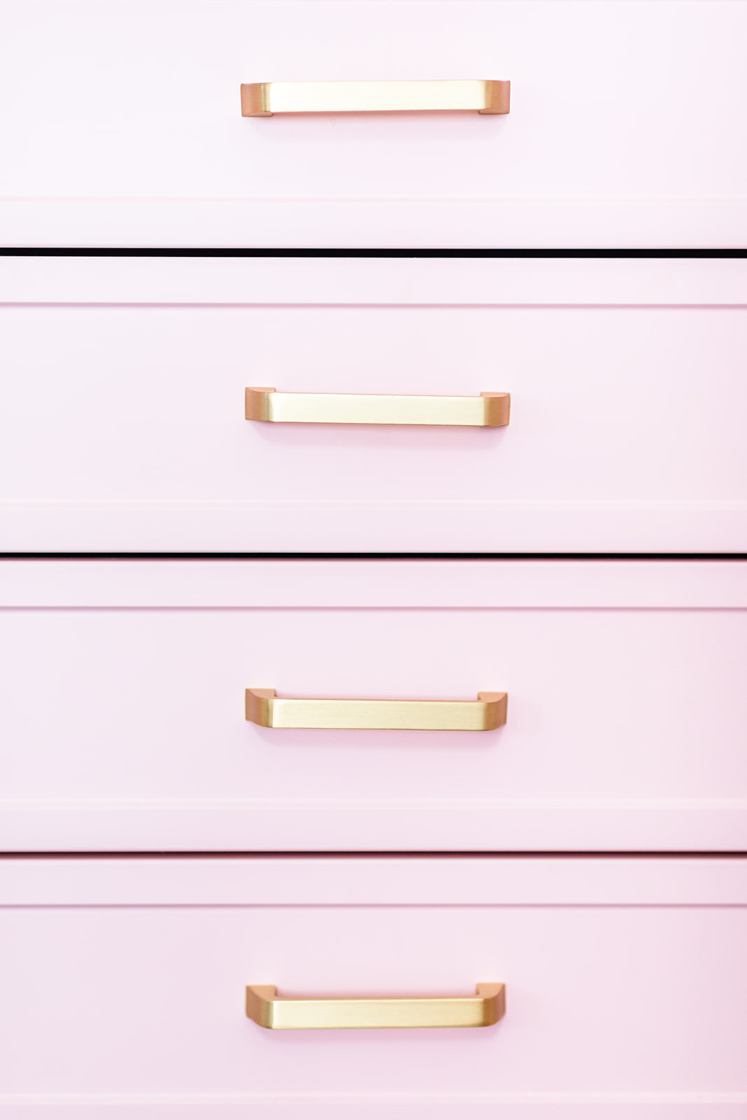 pink-cabinets-with-gold-handles.jpg
