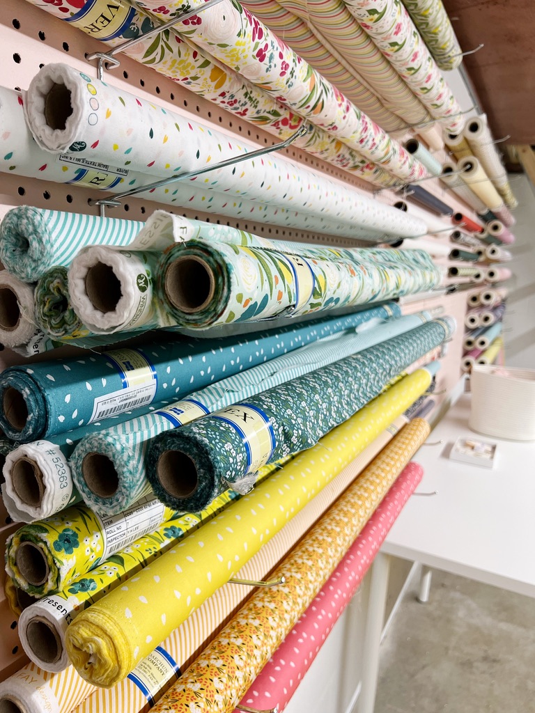 fabric storage on giant pegboard