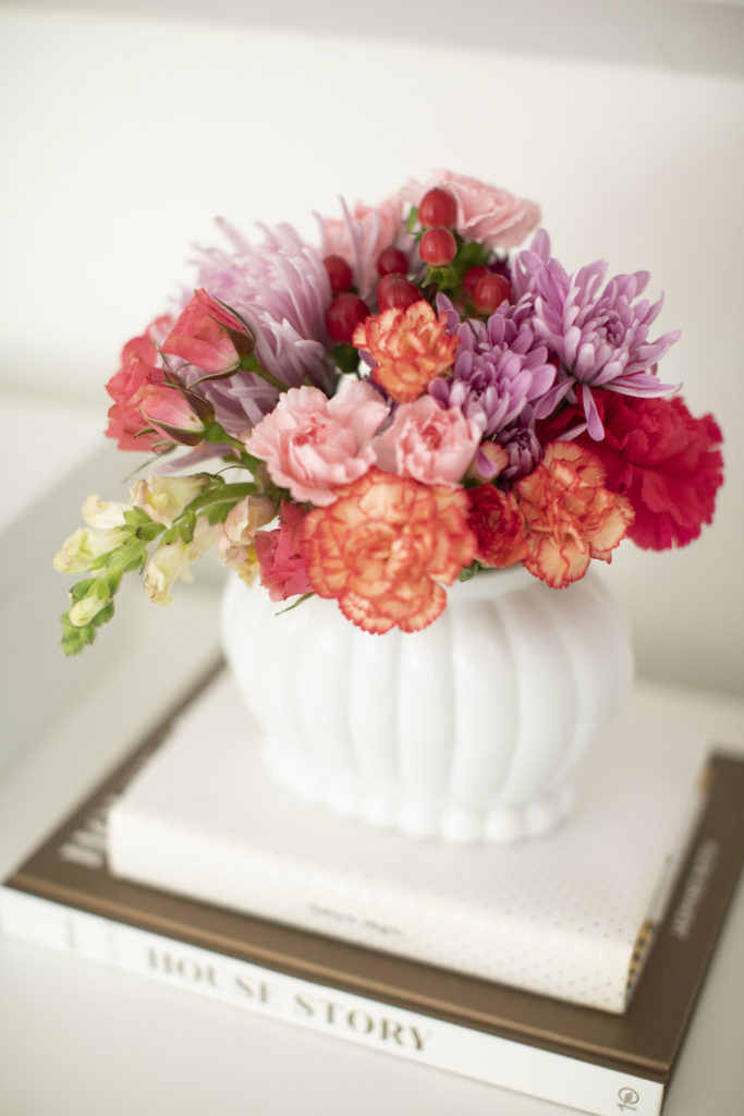 fresh flowers in white vase