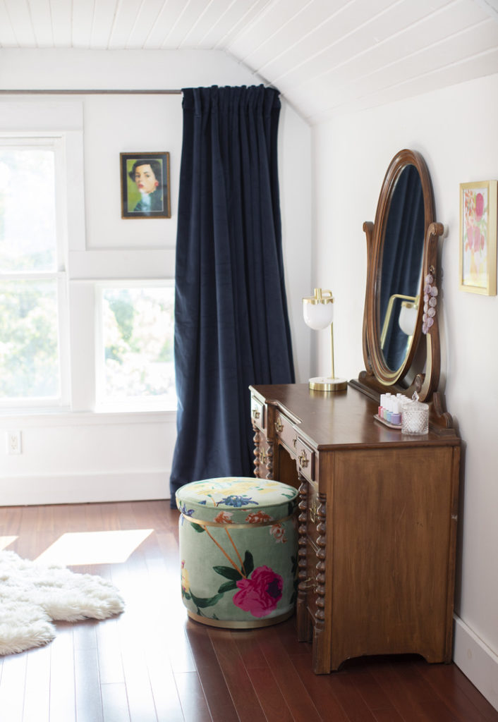 Tessie Fay's bedroom with curtains, vanity and nail painting station