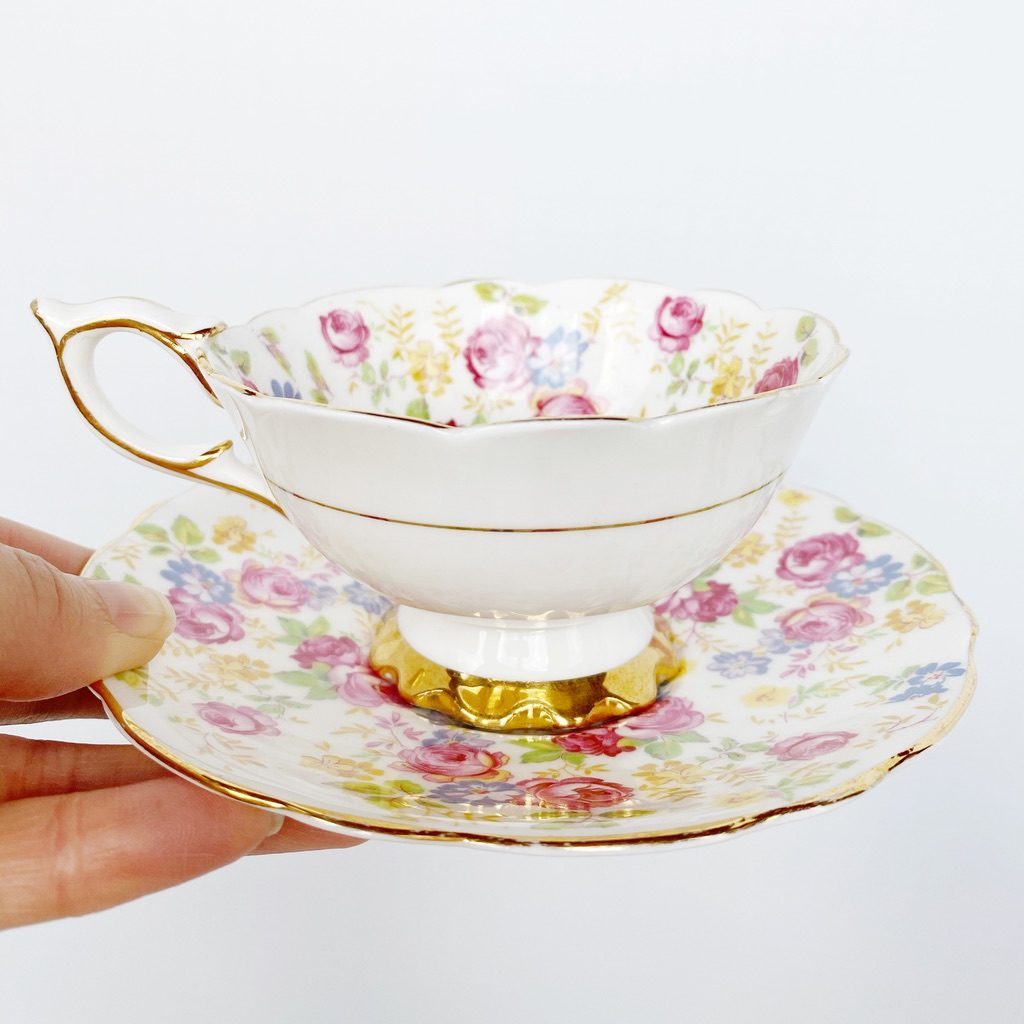 dainty floral teacup with gold trim 