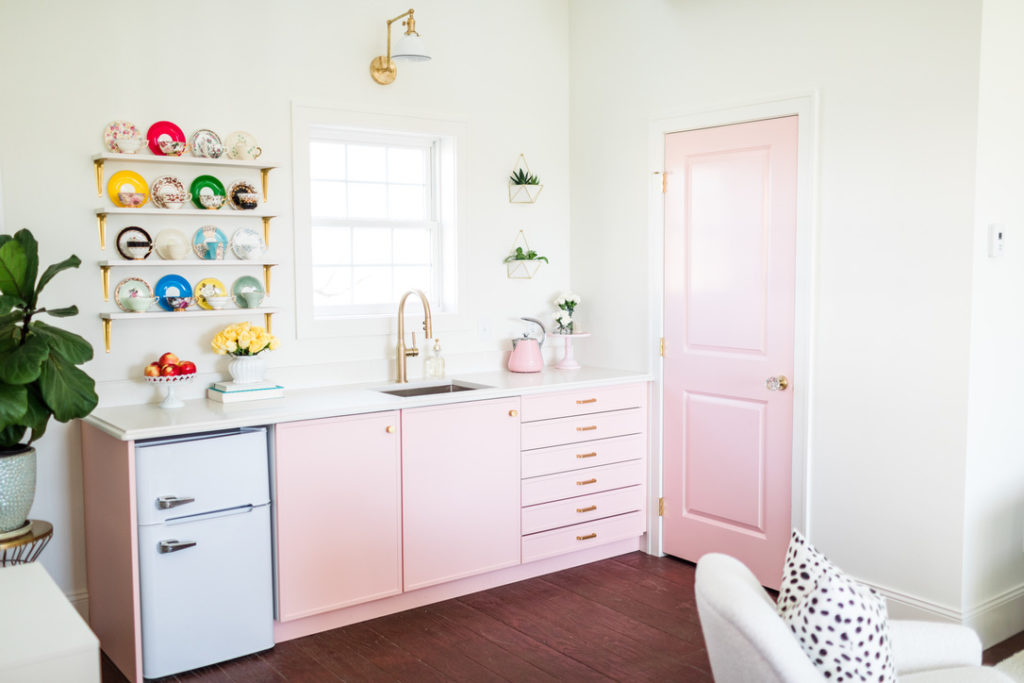 Pink cabinets and wet bar in Tessie Fay's art studio